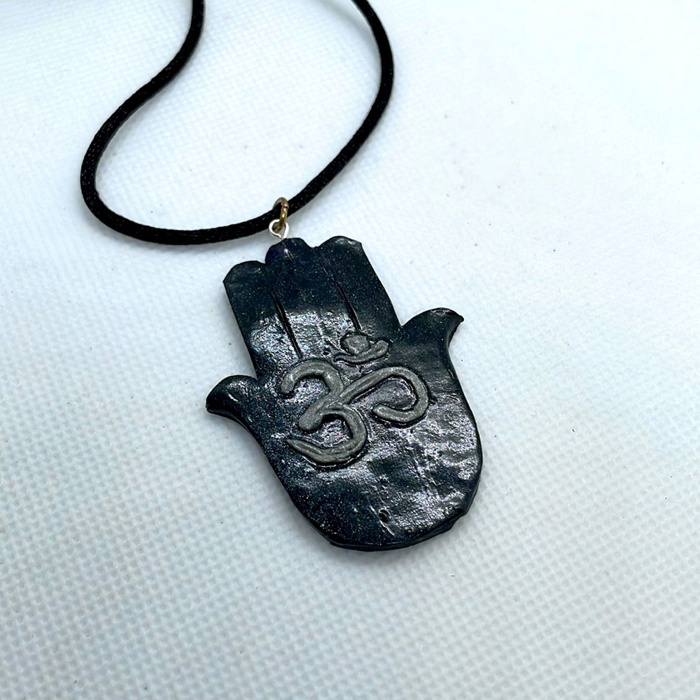 Ohm hamsa hand clay pendant